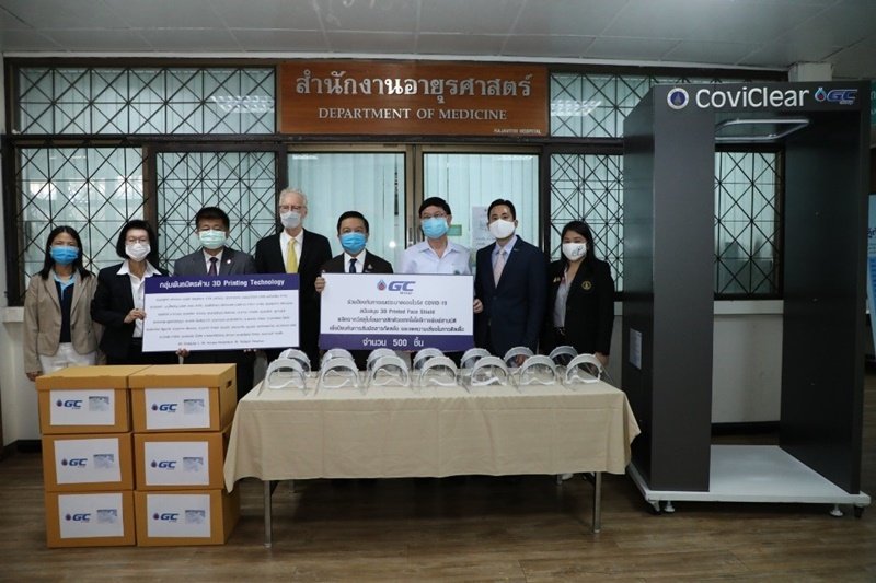 Dr. Kongkrapan Intarajang, CEO of GC, together with his executive team, present CoviClear, or the silver nanoparticle disinfection unit to help reduce the risk of COVID-19 transmission, and PPE, to Rajavithi Hospital